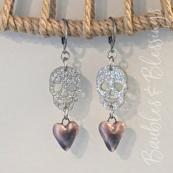 Glittery Skull Earrings with Purple Ceramic Hearts