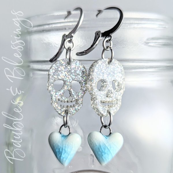 Glittery Skull Earrings with Blue Ceramic Hearts