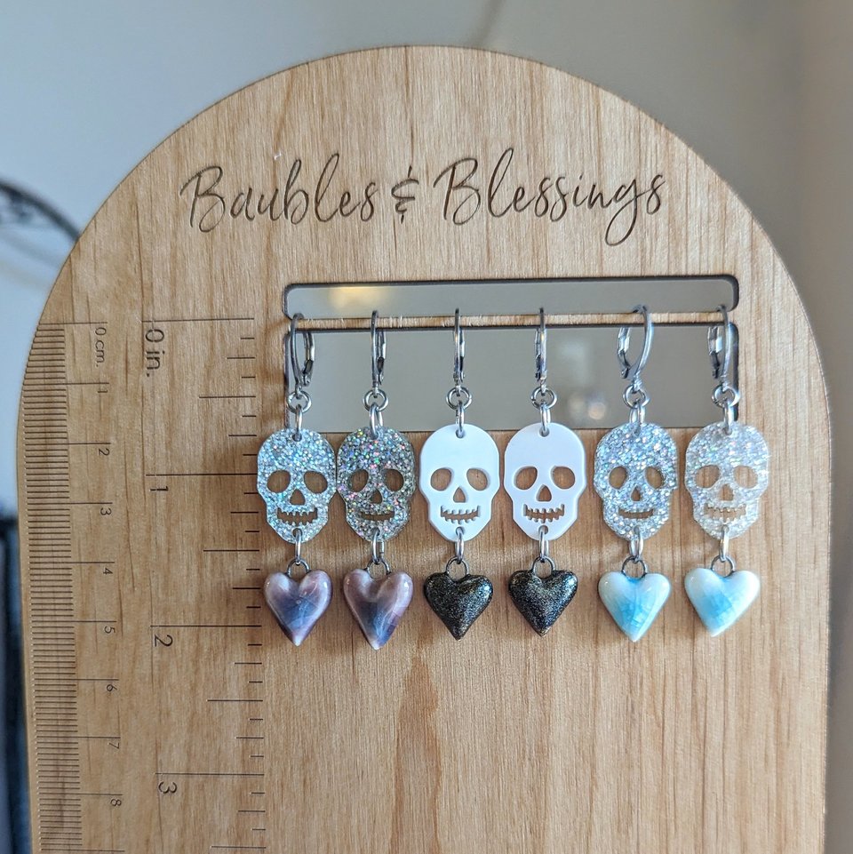 Glittery Skull Earrings with Blue Ceramic Hearts