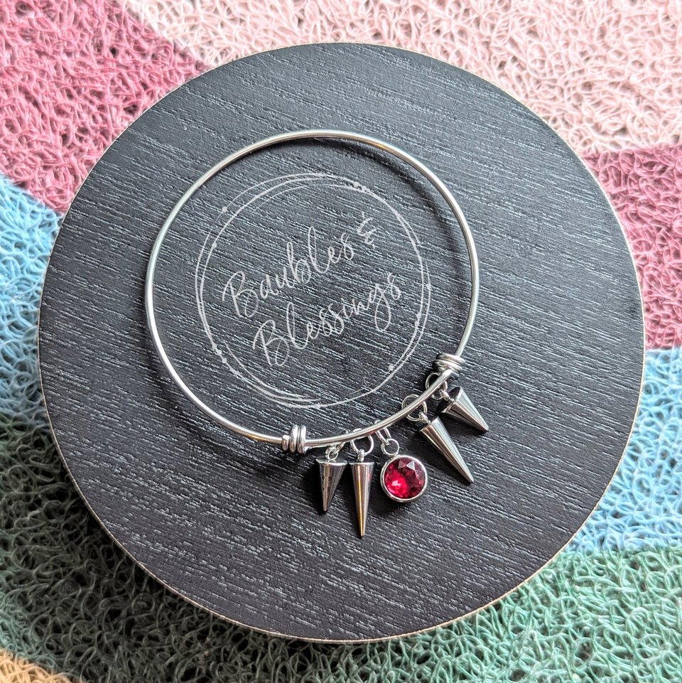 Bangle Bracelet with Red Crystal & Spike Charms