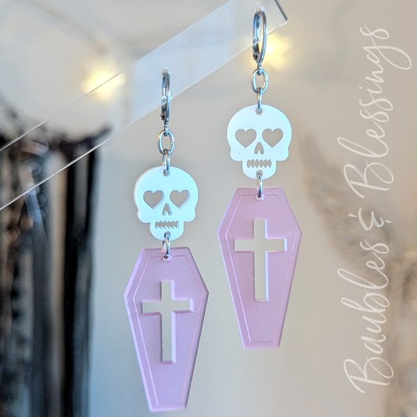 Matte Pink Acrylic Coffin Earrings with Adorable Skulls
