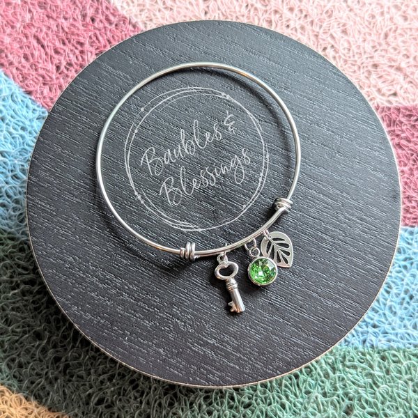Bangle Bracelet with Lime Crystal, Leaf & Key Charms