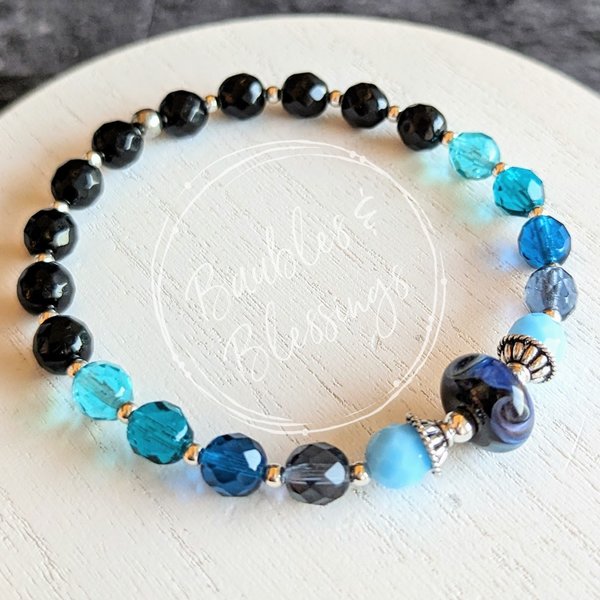 Elegant Swirl Blue Lampwork Bead Bracelet with Quartz or Onyx